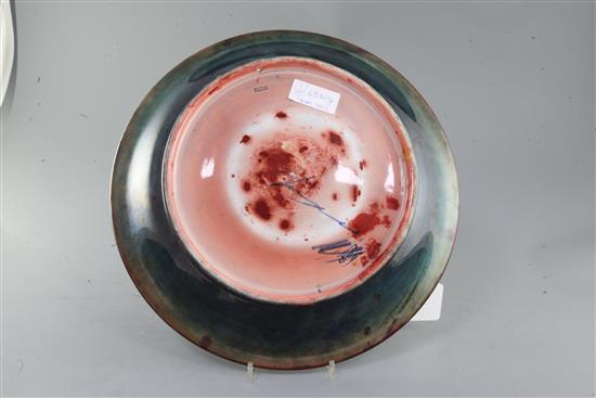 A large Moorcroft flambé leaf and berry dish, c.1928-36, diameter 37.5cm